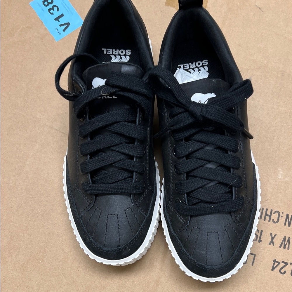 Sorel woman’s  Black and White Sneakers 6.5